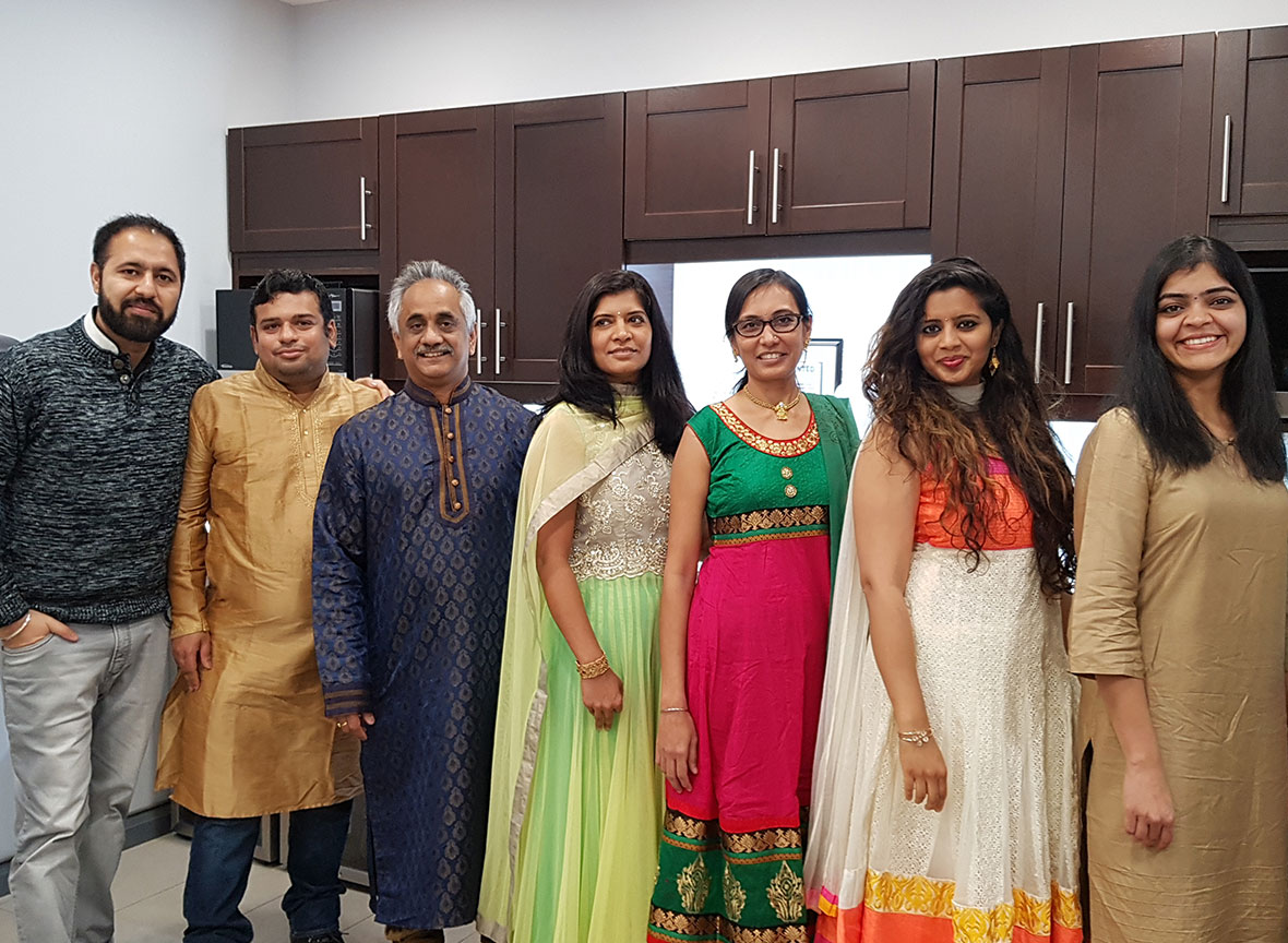 employees dressed in diwali traditional costume